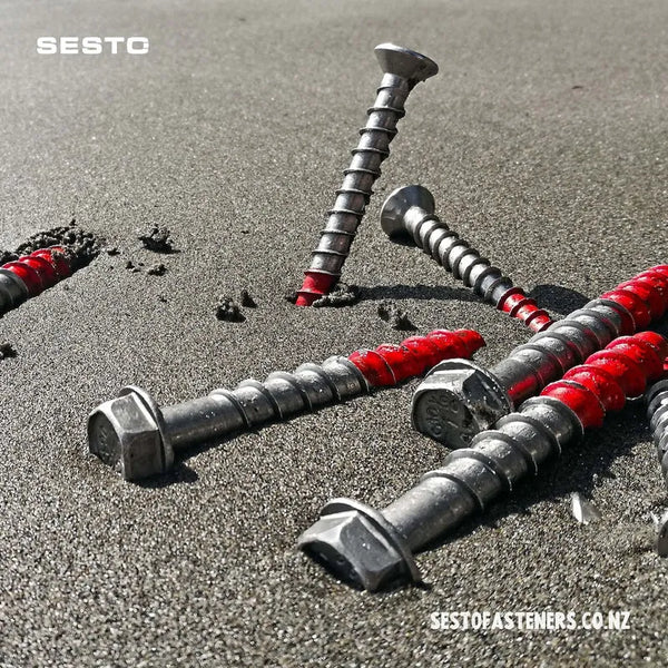 Sesto Screwbolt promo image with Hex head bolts arranged on beach sand. 