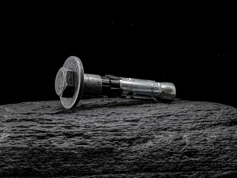 ATS Evo Heavy Duty panel anchor resting on black marble base.