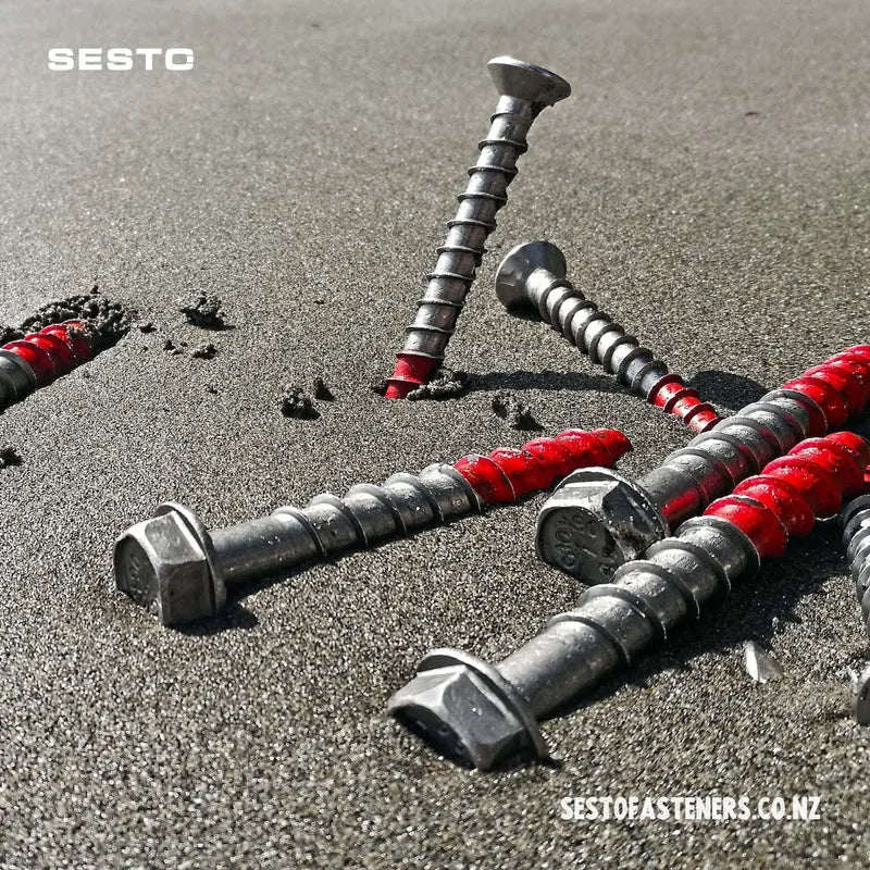 Sesto Screwbolt promo image with Hex head bolts arranged on beach sand. 