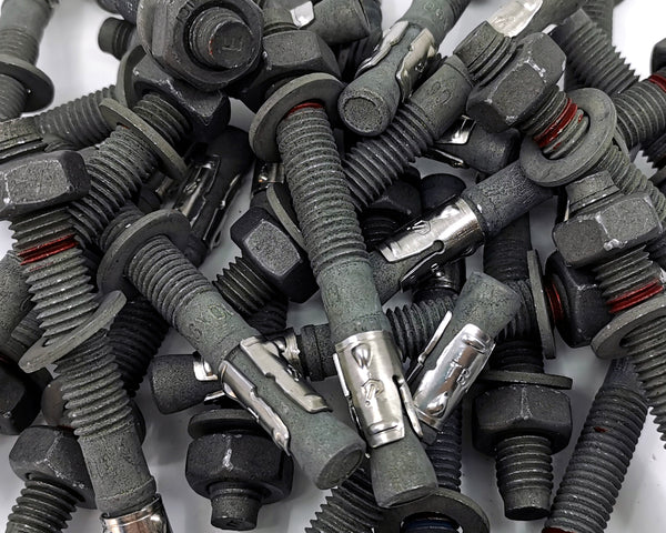 ICCONS Sheradised Through Bolts arranged in a pile.