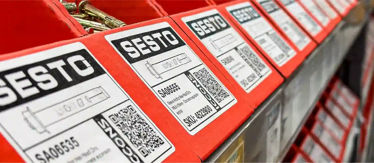 Banner image showing SESTO red display boxes filled with concrete anchors.